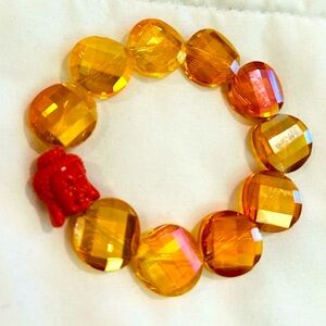 Yellowish Orange Crystal Beaded Stretch Bracelet with Buddha Charm